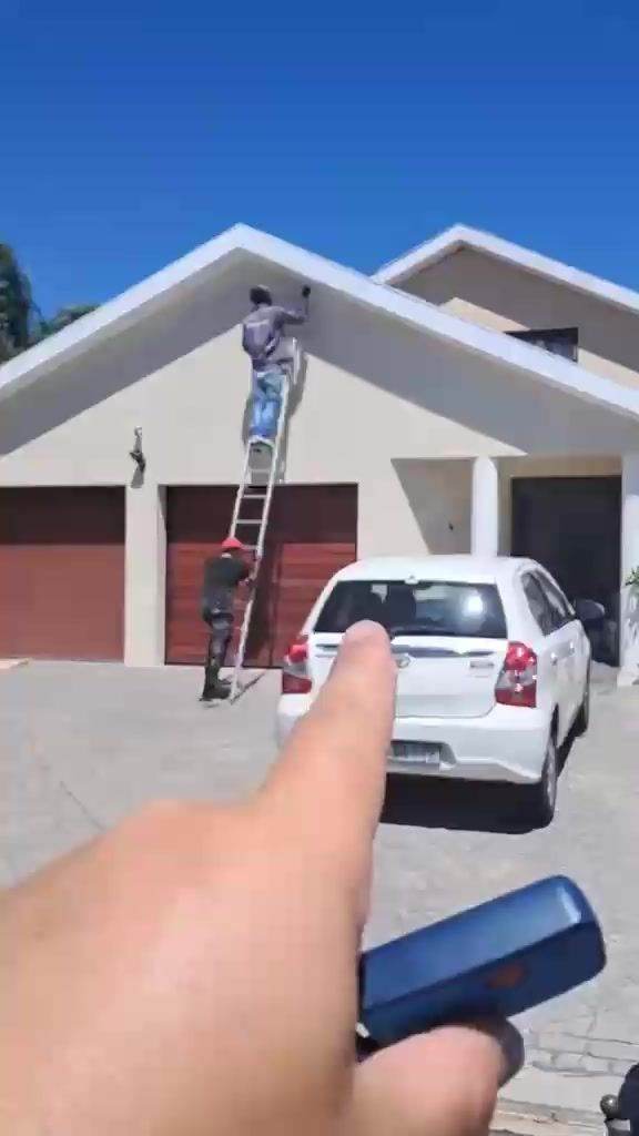 Exterior wall painting in progress